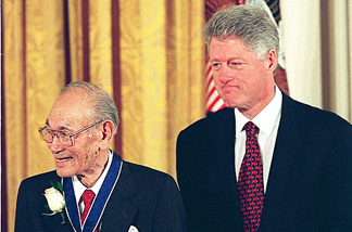 President Bill Clinton (R) stands with Fred Korematsu (L) after awarding him the Presidential Medal of Freedom, the nation's highest civilian honor, January 15, 1998.