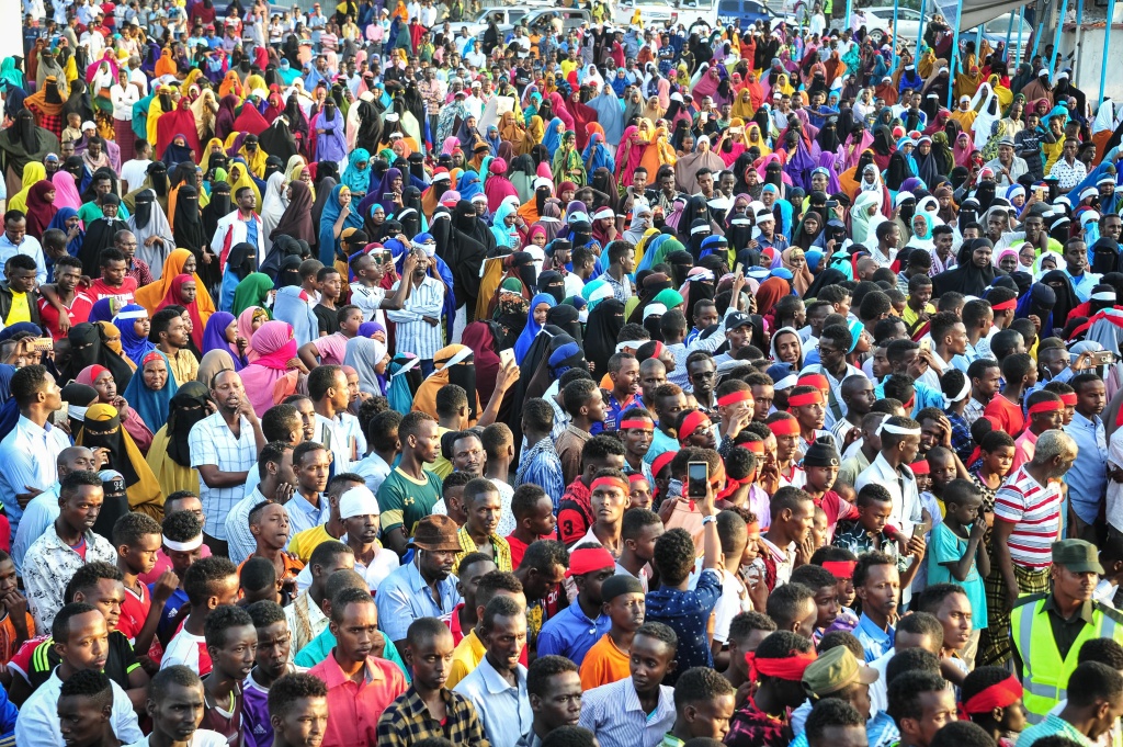 SOMALIA-BOMBING-CONFLICT-PROTEST People protest after a truck bomb exploded outside of the Safari Hotel in Mogadishu on October 15, 2017.