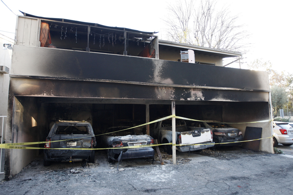 Suspect Arrested In Slew Of Los Angeles Arson Fires An apartment complex that was burned in a spree of arson fires lies in ruins on Jan. 2, 2012, in Los Angeles, Calif. Police have taken 24-year-old Harry Burkhart into custody, the man believed responsible for setting more than 50 fires over the weekend.