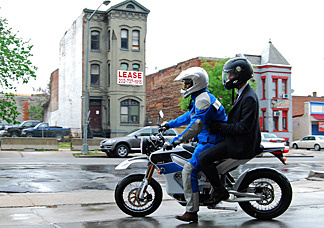 NPR's Guy Raz rides behind Zero Motorcycles' Neal Saiki on the 2010 Zero S street bike.