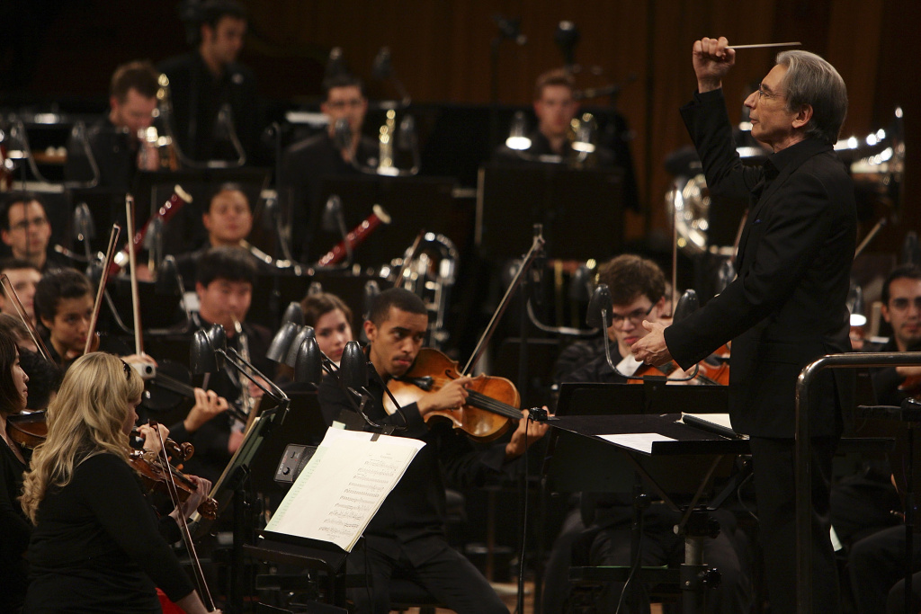 YouTube Symphony Orchestra Finale Takes Place In Sydney Conductor Michael Tilson Thomas performs on stage with the YouTube Symphony Orchestra at Sydney Opera House on March 20, 2011 in Sydney, Australia.