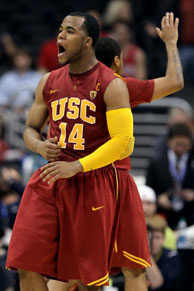 Donte Smith #14 of the USC Trojans reacts after making a basket in the first half against the Arizona Wildcats in the semifinals of the 2011 Pacific Life Pac-10 Men's Basketball Tournament at Staples Center on March 11, 2011 in Los Angeles.
