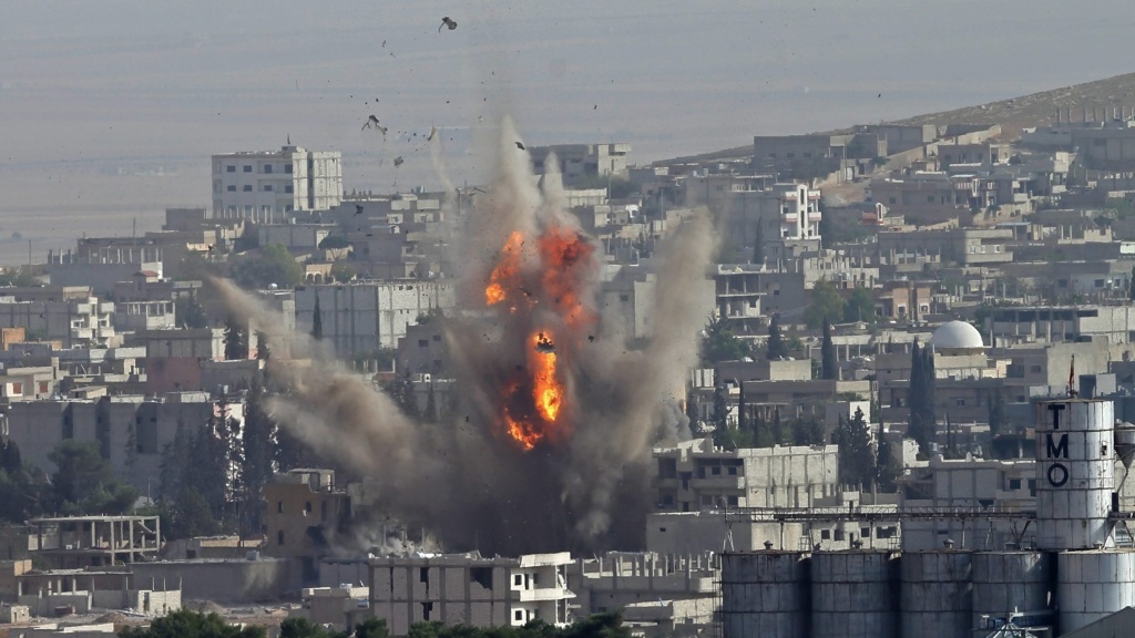 Smoke rises after a U.S.-led coalition airstrike on Kobani, Syria, Monday, as seen from the Turkish side of the border. Kurdish fighters say they're making progress against ISIS in the area. Smoke rises after a U.S.-led coalition airstrike on Kobani, Syria, Monday, as seen from the Turkish side of the border. Kurdish fighters say they're making progress against ISIS in the area.