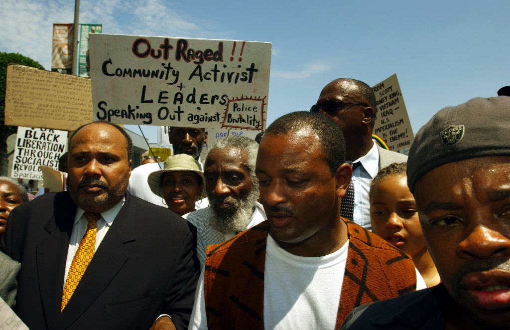 Police Beating of 16-Year-Old Protested Activists Martin Luther King III (left), Dick Gregory (center) and Najee Ali (right) march to protest the videotaped beating of 16-year-old Donovan Jackson by Inglewood police officers.