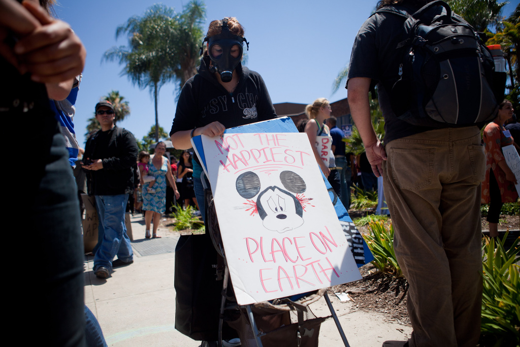 Protests Continue In Anaheim Against The Police Department's Recent Shootings ANAHEIM, CA - JULY 29: Protesters march past the Orange County Police Department during a demonstration to show outrage for the several recent office involved shootings on July 29, 2012 in Anaheim, California. For the past week, protesters have clashed with police resulting in both property damage and many arrests. (Photo by Jonathan Gibby/Getty Images)