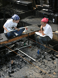 Mercer 7371 Excavators Kristen Vowels and Samantha Green looking for fossils at Pit 91 at the La Brea Tar Pits.