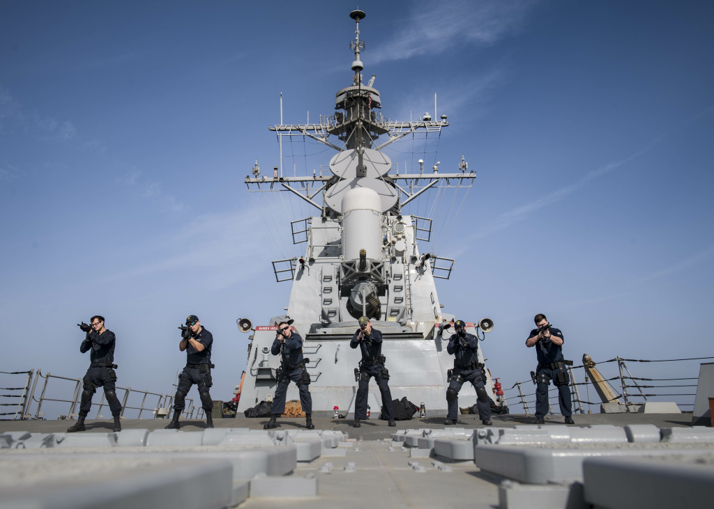 Sailors practice handling rifles during a visit, board, search and seizure training. (Feb. 21, 2018) Sailors practice handling rifles during visit, board, search and seizure (VBSS) training aboard the Arleigh Burke-class guided-missile destroyer USS Preble (DDG 88).