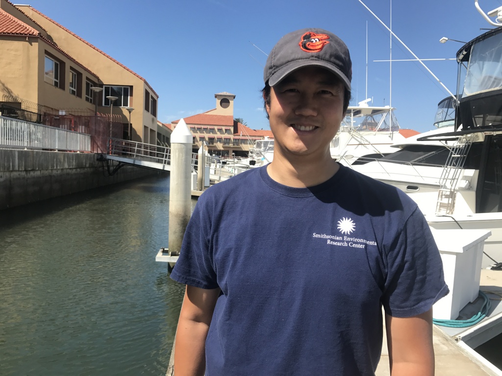 Smithsonian scientist Andy Chang is part of a team surveying 20 local harbors and ports to monitor marine invasive species. Smithsonian scientist Andy Chang is part of a team surveying 20 local harbors and ports to monitor marine invasive species.