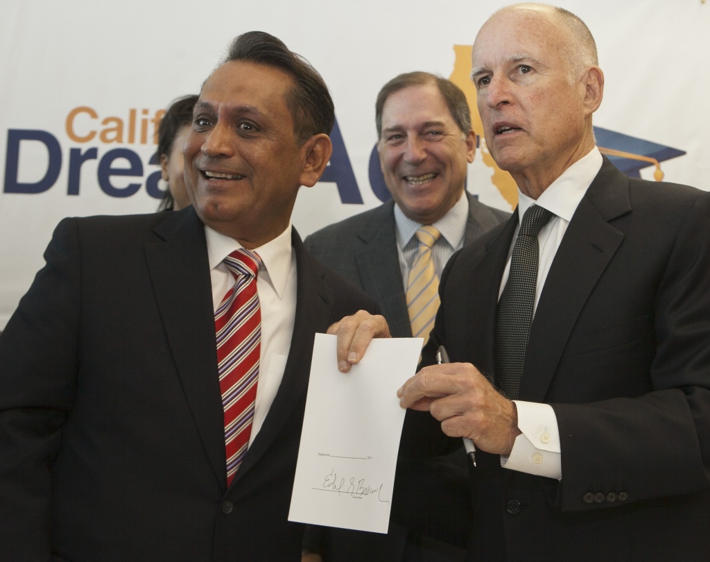 Gov. Jerry Brown, right, endorsed Gil Cedillo, left, Tuesday for the Los Angeles City Council's First District. He faces two opponents in the March 5 primary.
