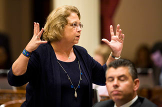 File photo: California State Sen. Denise Ducheny (D-San Diego) reacts to Republican efforts to hold up the vote on a solution to the state's budget problem on the evening of July 23, 2009 in Sacramento.