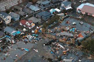An aerial view shows debris that remained on the ground after a tsunami wave to have hit Hitachinaka city in Ibaraki prefecture on March 11, 2011.