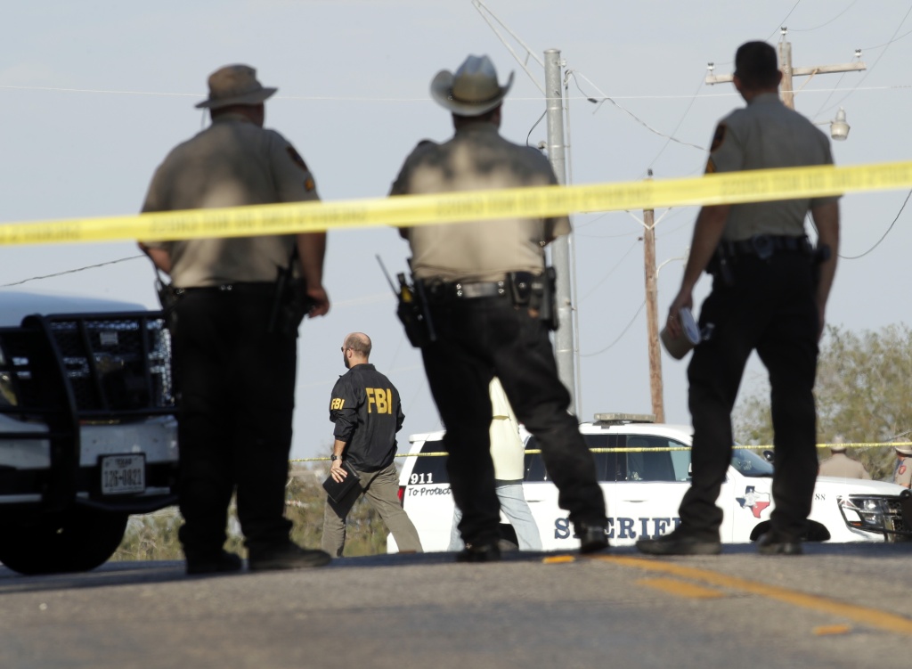 At Least 20 People Killed 24 Injured After Mass Shooting At Texas Church Law enforcement officials gather near the First Baptist Church following a shooting on November 5, 2017 in Sutherland Springs, Texas.