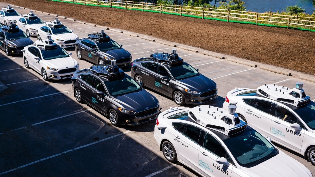 Pilot models of self-driving cars for Uber are displayed in Pittsburgh. Autonomous vehicles are expected to cut traffic jams, but not before enough human drivers are off the road. Pilot models of self-driving cars for Uber are displayed in Pittsburgh. Autonomous vehicles are expected to cut traffic jams, but not before enough human drivers are off the road.