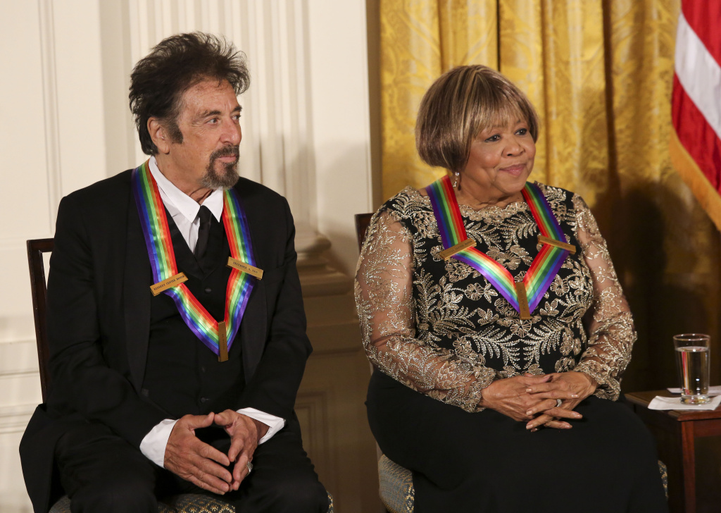 President Barack Obama Delivers Remarks At The Kennedy Center Honors Reception WASHINGTON, DC - DECEMBER 4: Actor Al Pacino, and singer Mavis Staples listen to President Barack Obama speak during a ceremony for the 2016 Kennedy Center honorees December 4, 2016 in the East Room of the White House in Washington, DC. The honorees include Eagles band members, actor Al Pacino, singer James Taylor, pianist Martha Argerich and singer Mavis Staples. (Photo by Aude Guerrucci-Pool/Getty Images)