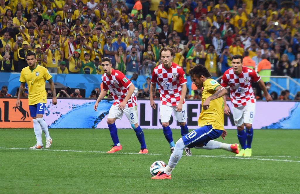 Brazil v Croatia: Group A - 2014 FIFA World Cup Brazil Neymar of Brazil takes a penalty kick during the 2014 FIFA World Cup Brazil Group A match between Brazil and Croatia at Arena de Sao Paulo on June 12, 2014 in Sao Paulo, Brazil.