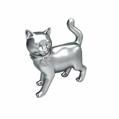 This image provided by Hasbro shows a new Monopoly game piece. One of the eight classic tokens, the iron, was voted out in an online contest, Hasbro announced Wednesday. The vote was part of an effort to jazz up the board game, which debuted in the 1930s.
