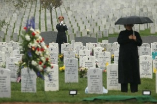 Mercer 18378 A bugler plays the 'Taps' during the funeral of U.S. Army Air Forces Tech. Sgt. James G. Maynard April 22, 2011 at Arlington National Cemetery in Arlington, VA.