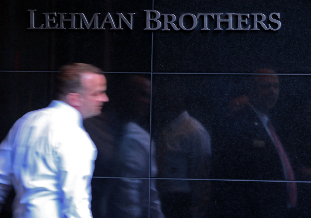 File: Lehman Brothers employee leaves the building in New York.
File: Lehman Brothers employee leaves the building in New York.