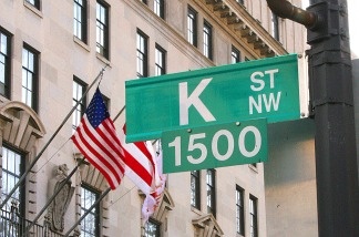 Mercer 12057 A sign showing K Street is shown in Washington,DC. A stone's throw from the White House, K Street is an alternative corridor of power in US politics, packed with thick carpeted offices and lobbyists with even deeper pockets.