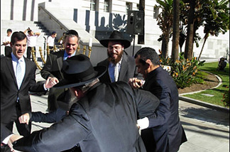 Mercer 7774 A few years ago, City Councilmen Garcetti and Weiss and Mayor Villaraigosa celebrate with rabbis from Chabad on the first day of Hanukkah.