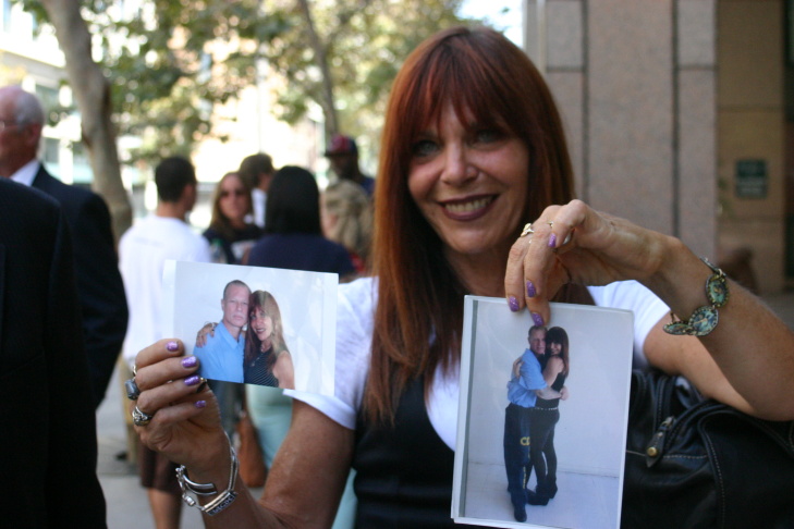 Christina Combs, Larsen's fiance, shows off recent pictures. 