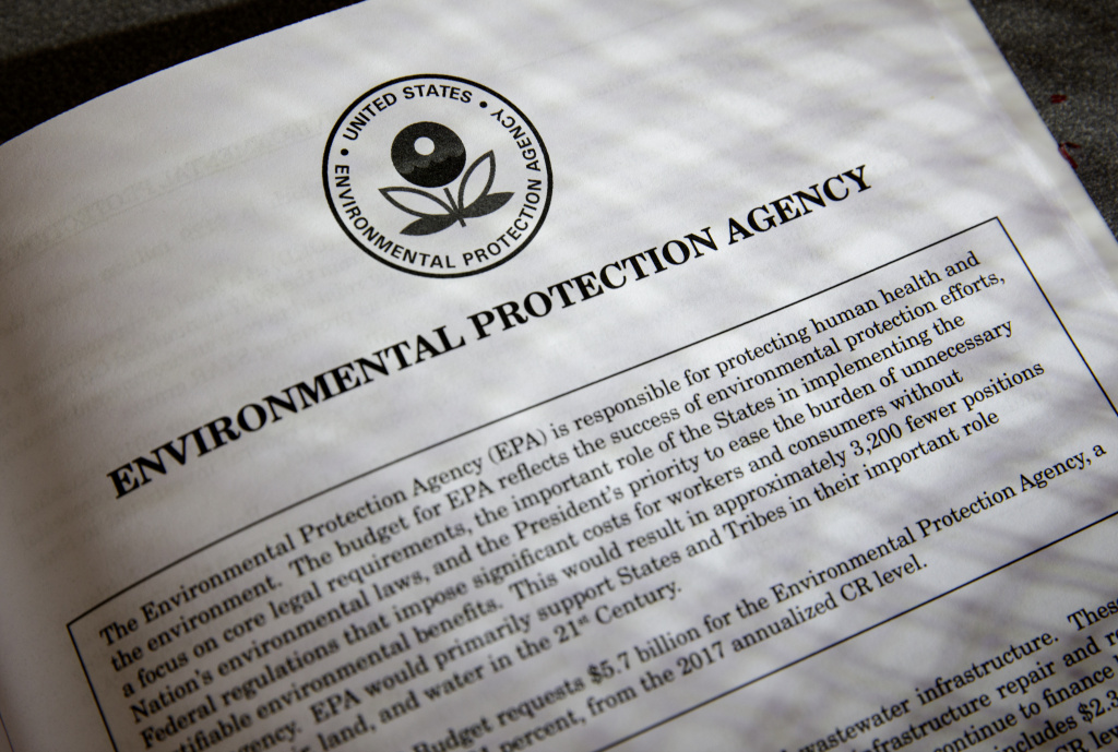 Trump Budget Proposals for the Environmental Protection Agency (EPA) in President Donald Trump's first budget are displayed at the Government Printing Office in Washington, Thursday, March, 16, 2017. The $1.15 trillion presentation proposes a reordering of national spending priorities, pumping significantly more money into the military and homeland security while sharply cutting foreign aid, medical research and the arts. The document also proposes money for the U.S.-Mexico border wall Trump vowed in his campaign to have Mexico finance. The EPA also takes a big hit in the budget proposal.