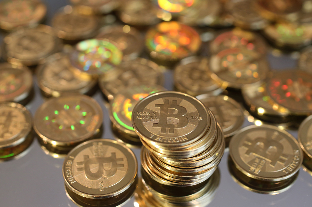 Utah Software Engineer Mints Physical Bitcoins A pile of Bitcoins are shown here after Software engineer Mike Caldwell minted them in his shop on April 26, 2013 in Sandy, Utah.