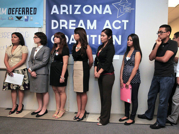 Arizona DREAM Act Coalition staff members, other advocacy group representatives and young immigrants line up in Phoenix last August for guidance about the federal program called Deferred Action, that would help illegal immigrants avoid deportation. Arizona DREAM Act Coalition staff members, other advocacy group representatives and young immigrants line up in Phoenix last August for guidance about the federal program called Deferred Action, that would help illegal immigrants avoid deportation.