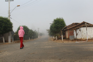 A young girl walks through the streets past homes damaged by the Feb. 27th earthquake on March 13, 2010 in San Pedro De Alcantara, Chile. The newly sworn in president Sebastian Pinera is faced with the challenge of repairing the damage done by the natural disaster.
