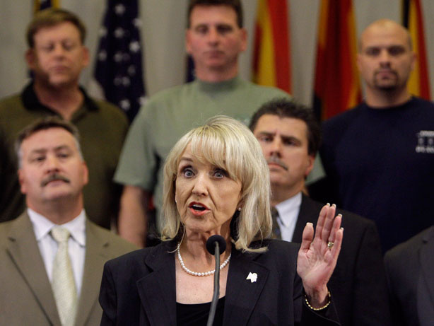 Republican Gov. Jan Brewer of Arizona talks about the sweeping new immigration bill she signed into law Friday, in Phoenix.