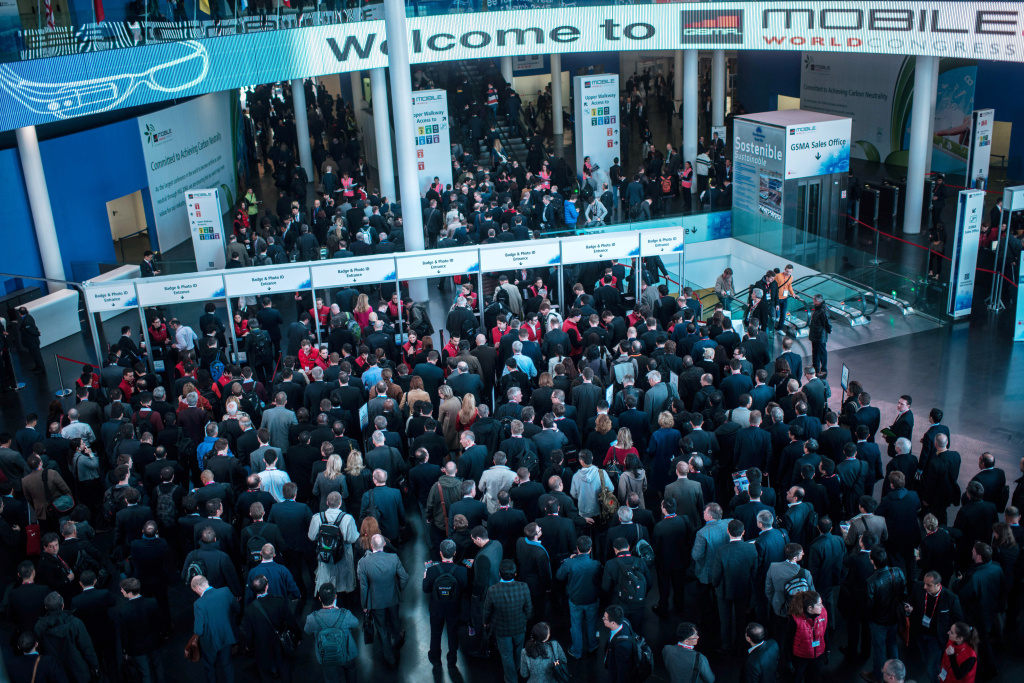 Mobile World Congress 2014 - Day 2 Visitors queue to get access to the venue during the second day of the Mobile World Congress 2014 at the Fira Gran Via complex on February 25, 2014 in Barcelona, Spain. The annual Mobile World Congress hosts some of the world's largest communication companies, with many unveiling their latest phones and gadgets. The show runs from February 24 - February 27.