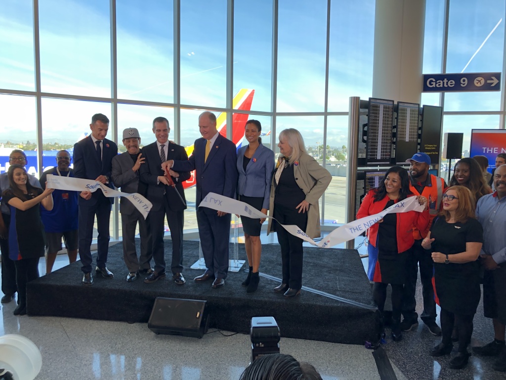 LAX Terminal 1 Officials and air travel representatives cut the ribbon on LAX's newly-renovated Terminal 1.