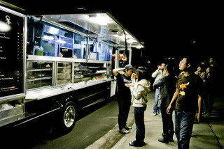 The Komodo Truck, serving a variety of burritos, salads and rolls, is one of the participants at the street food fest.