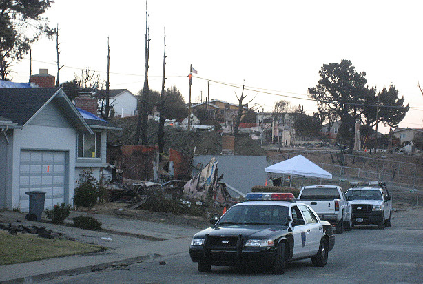 A patrol car is stationed in the Glenview neighborhood of San Bruno, Calif. File photo.
