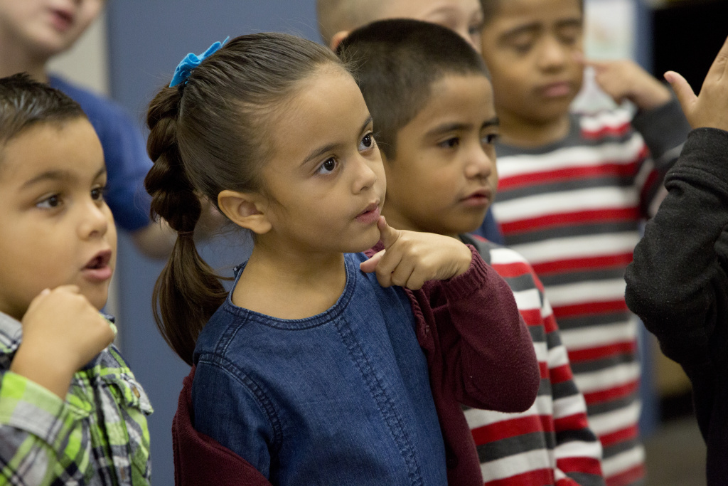 Dual Immersion mariachi - inline Lily De Dios sings with her classmates in Ron Morris' kindergarten class.