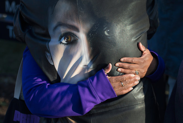 gettyimages-523316786_custom-270a2c776b6bcb508d52e523d7ba814cf4ffc188-s700-c85.jpg Fans comfort each other while visiting a memorial outside Paisley Park, the home and studio of Prince, on April 22, 2016.