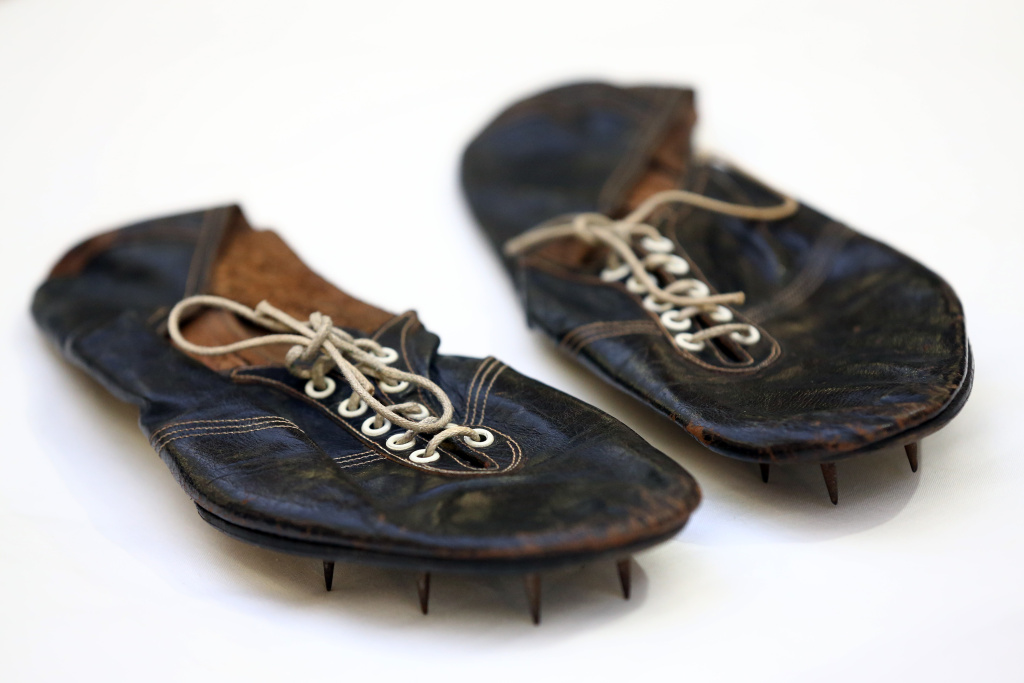 Auction Preview Of Historic Running Shoes Worn By Roger Bannister The running shoes worn by Sir Roger Bannister when he became the first man in history to run one mile in under 4 minutes are pictured at Christie's on May 20, 2015 in London, England.