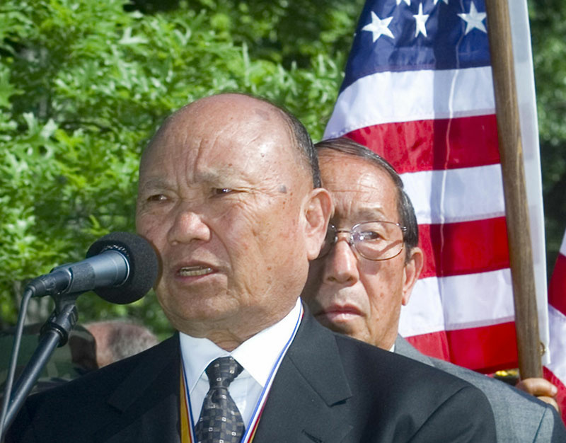 A file photo taken 11 May 2000 shows former Hmong general Vang Pao talking after laying a wreath at the Vietnam Memorial in Washington, DC, marking the 25th anniversary of the end of the Vietnam War in Laos.