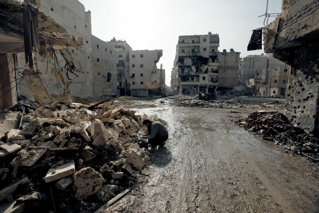 Syria Aleppo The U.S. and Germany said Friday that Russia must not provide the Assad regime with an advanced air defense system that they believe could prolong Syria's civil war. (Photo: A man is seen in the al-Amirya neighborhood of the city of Aleppo on December 2, 2012.)