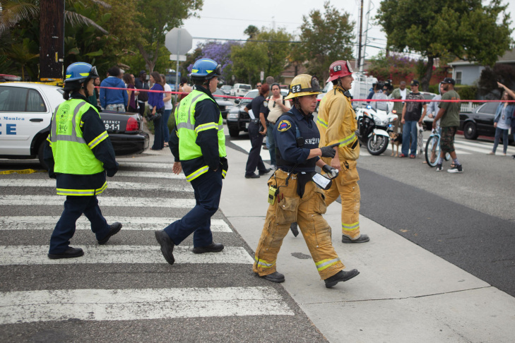 A student waits on the periphery of the Santa Monica College campus on Friday afternoon.