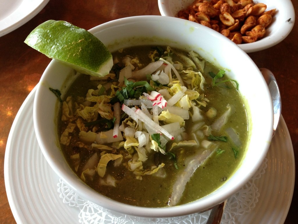 green pozole verde soup Pozole verde con callito de hacha (bay scallops) at Hugo's in Houston, Texas.