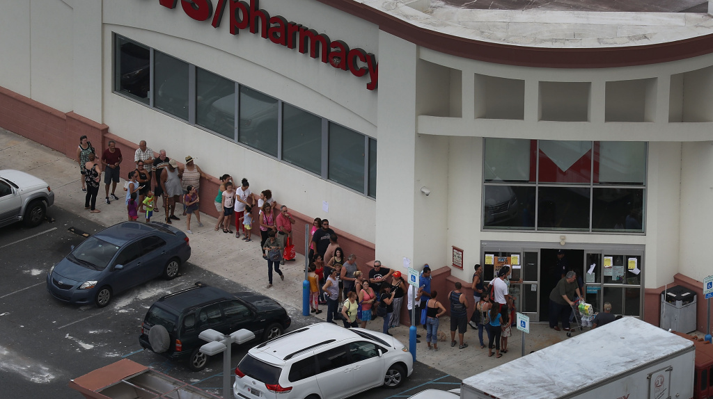 Puerto Rico Faces Extensive Damage After Hurricane Maria People line up at a CVS store as they deal with the aftermath of Hurricane Maria on September 25, 2017 in Levittown, Puerto Rico.