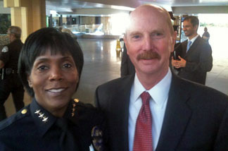 Ethel McGuire, assistant police chief for Los Angeles World Airports, and Randy Parsons, Los Angeles director of the Transportation Security Administration (TSA).