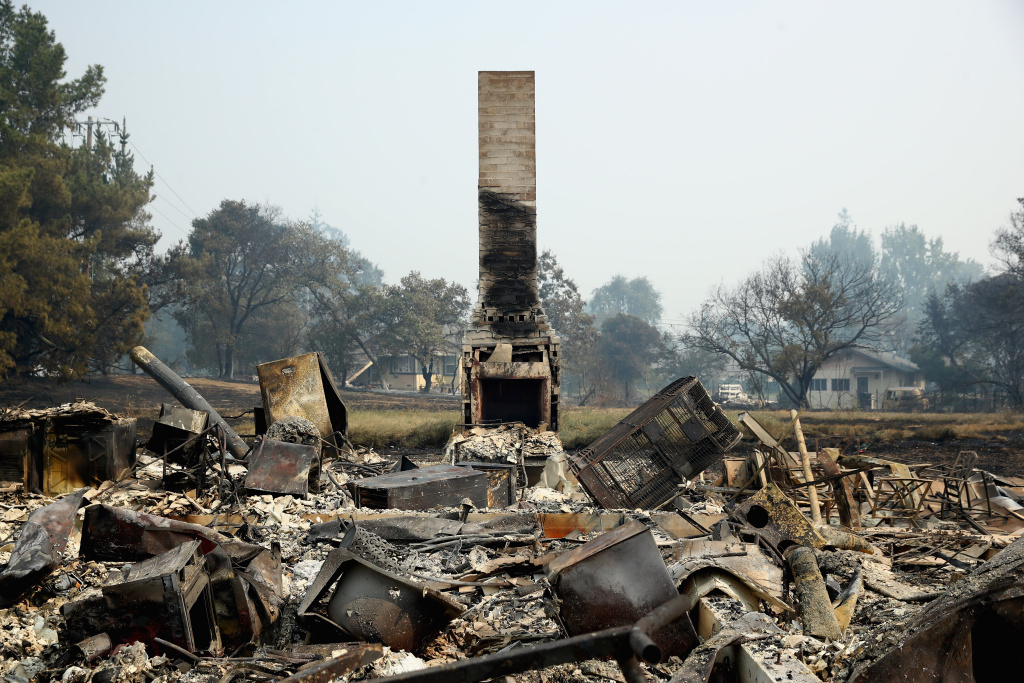 A view of the remains of homes that were destroyed by the Atlas Fire on October 10, 2017 in Napa, California. Fifteen people have died in wildfires that have burned tens of thousands of acres and destroyed over 2,000 homes and businesses in several Northen California counties.