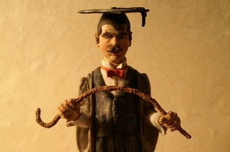 Mercer 16928 Disgruntled teacher represented in sculpture form.