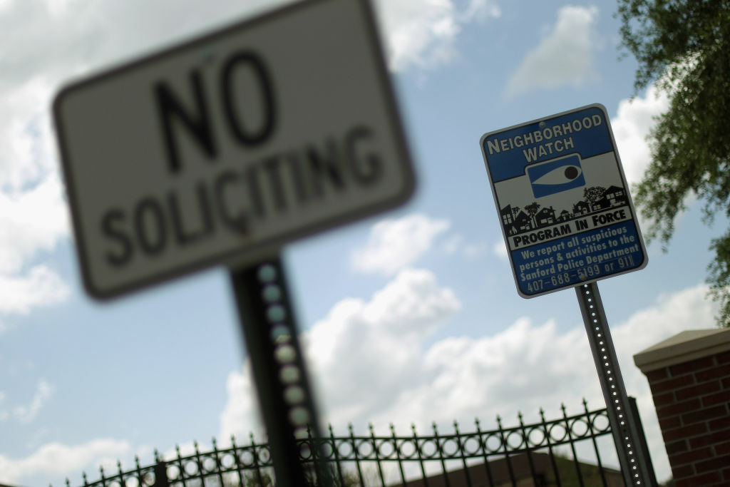 Trayvon Martin Shooting Brings Florida's Gated Communities Under Spotlight A neighborhood watch sign is seen in front of The Retreat at Twin Lakes gated community in Sanford, Florida.