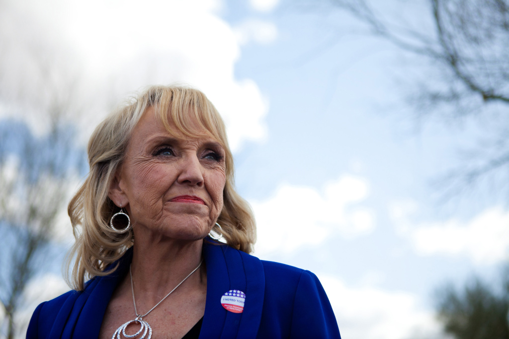 Arizona Holds Presidential Primary Arizona Gov. Jan Brewer talks to the news media after voting in the Republican presidential primary February 28, 2012 in Glendale, Arizona. Arizona is a winner take all state, with all the delegates from the state going to the winner of the primary. Early voting began in the state February 2, with over 300, 000 votes already cast as of February 27.