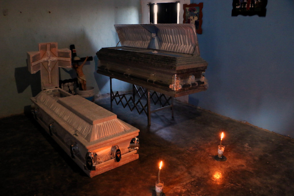 MEXICO-QUAKE View of victims's coffins placed in a house after a military helicopter that fell on a van in Santiago Jamiltepec, Oaxaca, Mexico, on February 17, 2018.