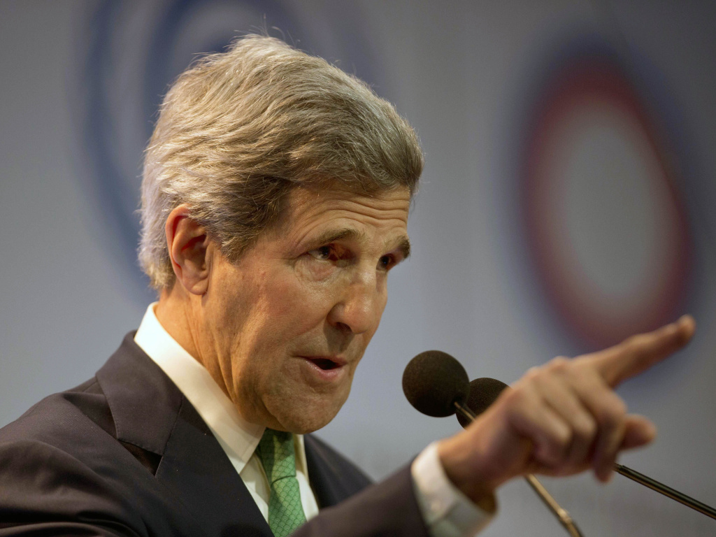 Secretary of State John Kerry delivers a speech at the U.N. Climate Change Conference in Lima, Peru, on Thursday. A major sticking point remains over how to divide greenhouse emissions targets. Secretary of State John Kerry delivers a speech at the U.N. Climate Change Conference in Lima, Peru, on Thursday. A major sticking point remains over how to divide greenhouse emissions targets.