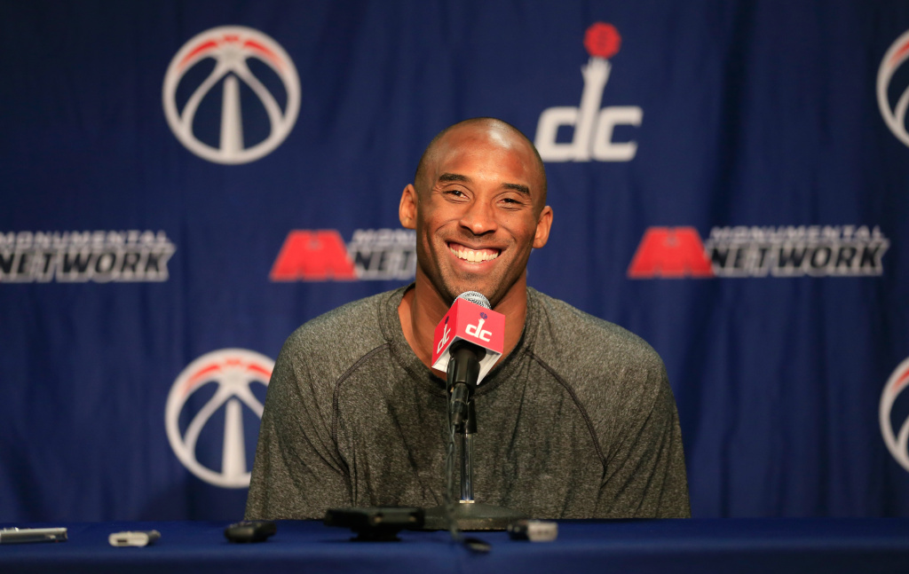 Los Angeles Lakers v Washington Wizards Kobe Bryant #24 of the Los Angeles Lakers talks with the media during a news conference before the start of the Lakers and Washington Wizards game at Verizon Center on November 26, 2013 in Washington, DC.